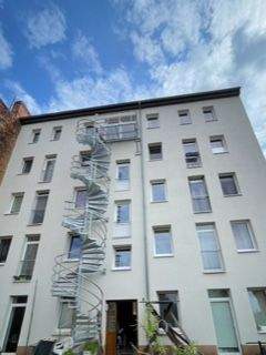 Außergewöhnliche Maisonette-Wohnung mit Galeriecharakter und Blick über Buckau - Hausansicht_Hofseite.jpeg